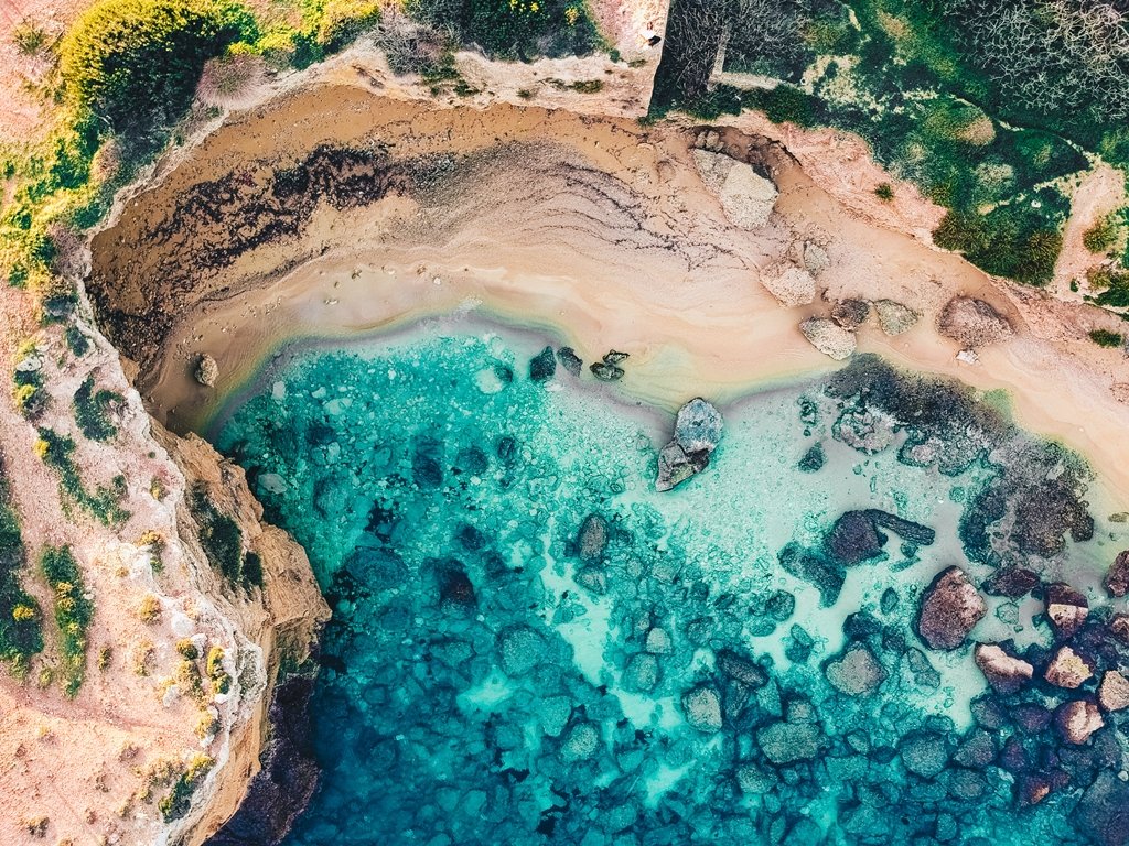 Drone view of a beach in the Plemmirio Nature Reserve close to Syracuse in Sicily